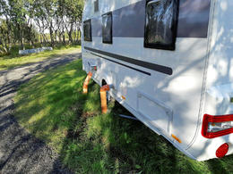 The RVs were connected to the area's sewage system without a proper permit.