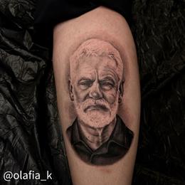 A portrait of Kári Stefánsson, CEO of deCode Genetics, on a calf.