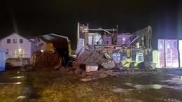 When the roof blew off debris flew all over the area and caused some damage and one house needed to be evacuated.