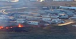 The fissure that opened up earlier today is at the edge of town to the north.