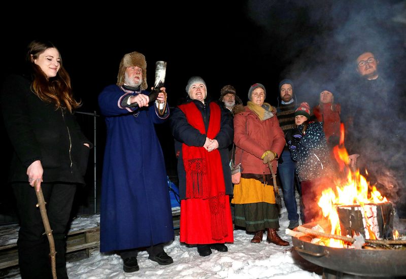 Members of Ásatrúarfélagið in Öskjuhlíð, Reykjavík, yesterday.