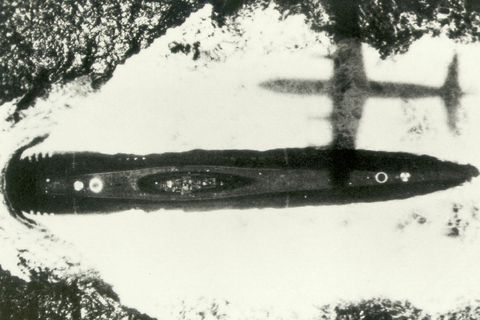 A maritime patrol aircraft follows a Russian submarine.