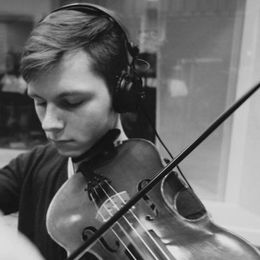 Bizub is an accomplished musician, skilled in the viola, piano and violin.