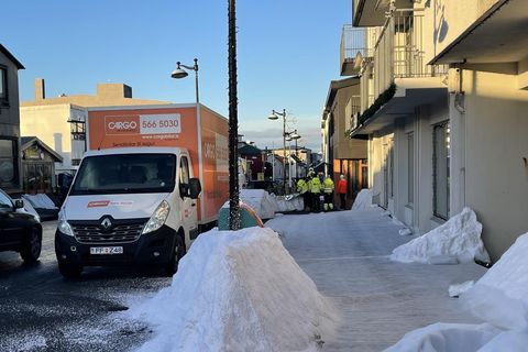 Fake snow and road signs in English are now seen everywhere in downtown Reykjanesbær.