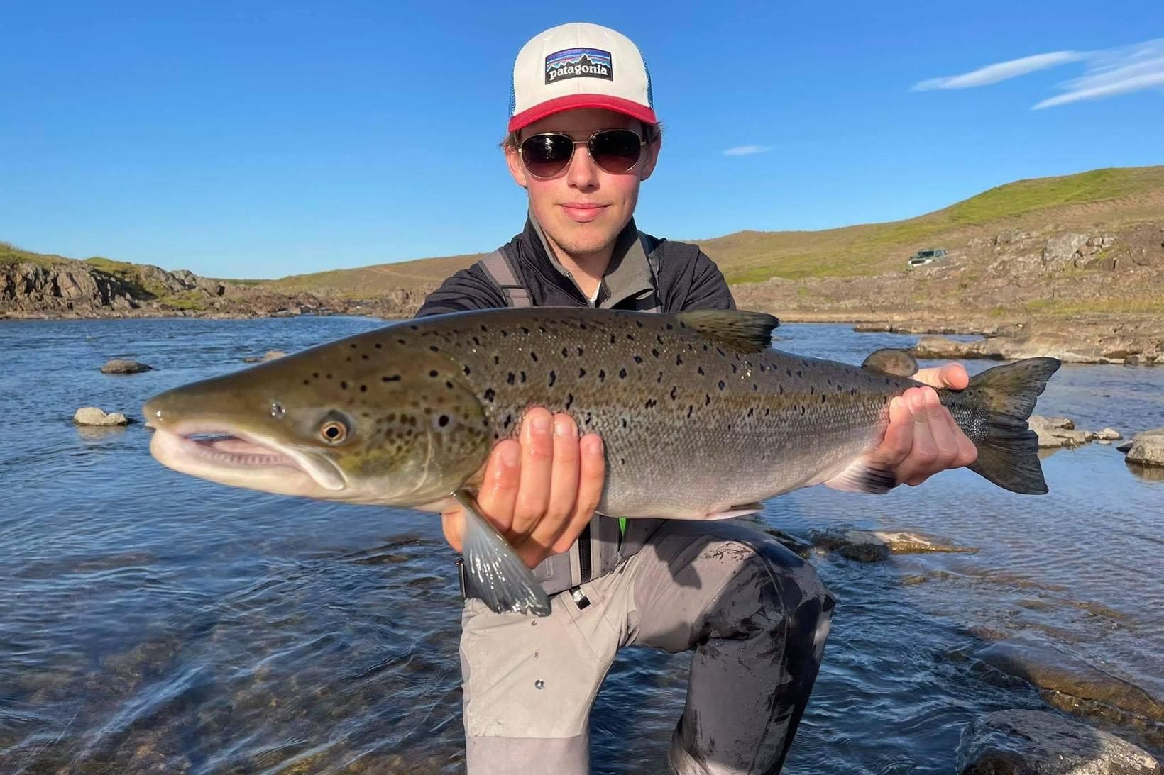 Hilmir Ævarsson með einn af mörgum löxum sem hann og …