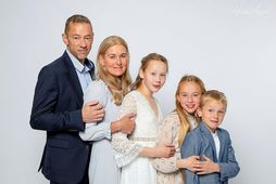Skemmtileg ljósmynd þar sem fjölskyldumeðlimum er raðað eftir hæð.