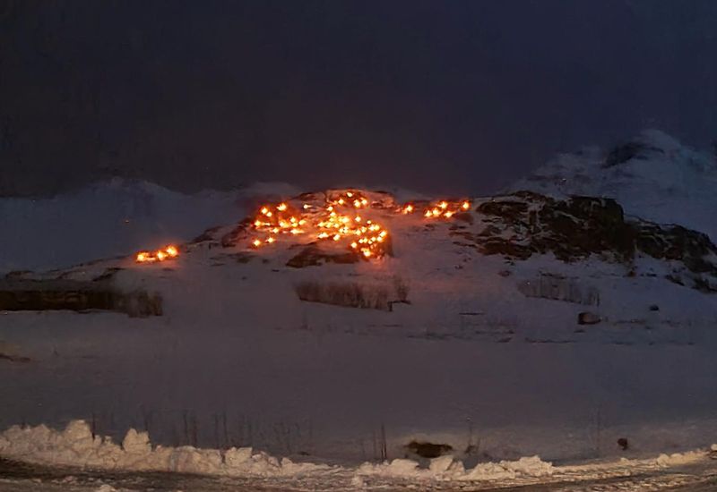 The capital of elves, East Iceland, illuminated by candle lights.