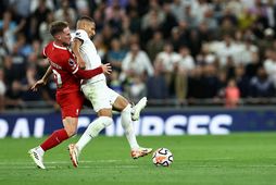 Alexis Mac Allister og Richarlison eigast við í leiknum umrædda.