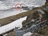 A photo taken by Stefánsson shows a man who has crossed all the safety barriers at Dettifoss, perched on the very edge of the waterfall.