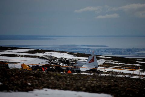 Flames destroyed most of the plane.