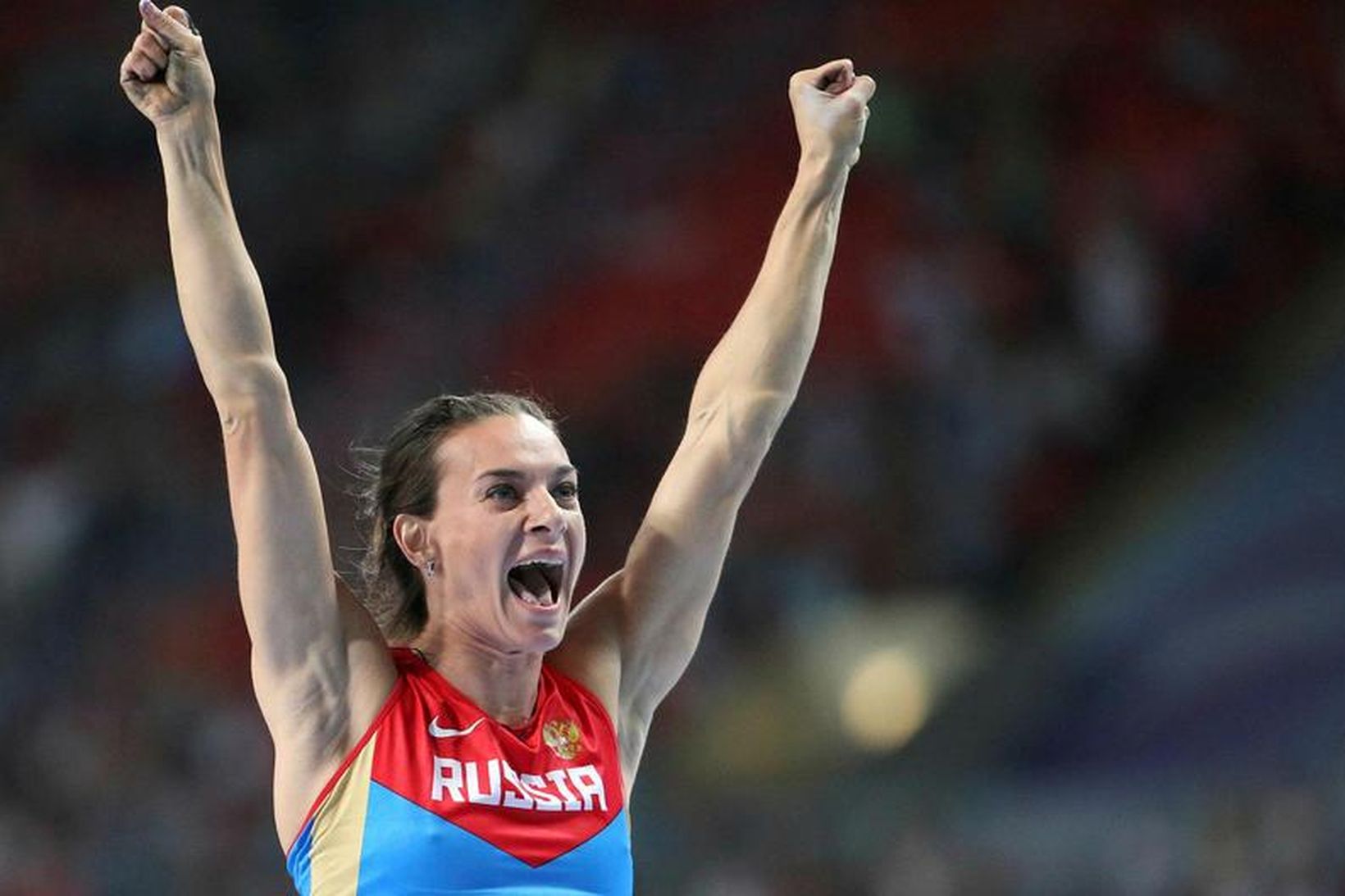 Yelena Isinbayeva á HM 2013 þar sem hún vann gullverðlaun, …